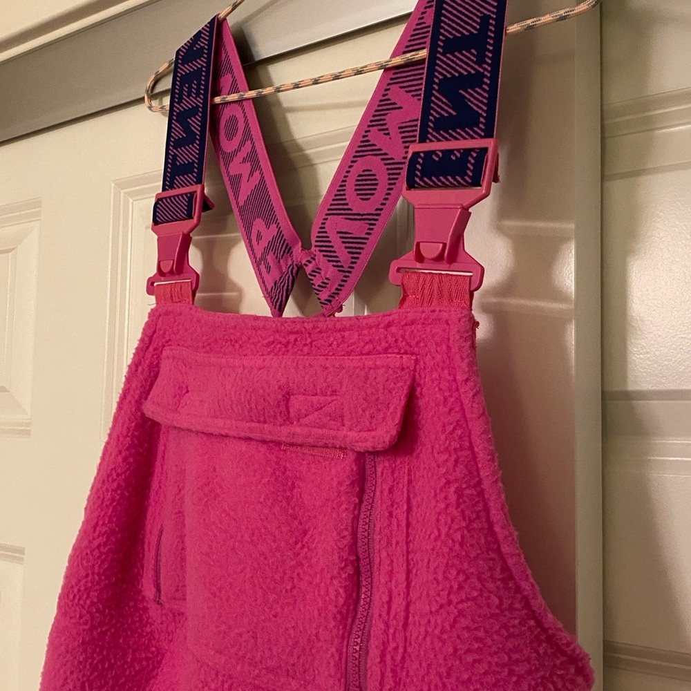 Free People hot pink fleece one-piece with a bib and adjustable suspender straps